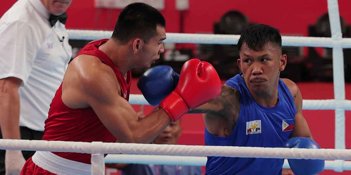 Eumir Marcial completes comeback KO win to assure PHL of a boxing bronze medal